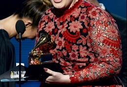 Adele accepts the Grammy Award for Best Pop Solo Performance at the 2013 Grammy Awards.